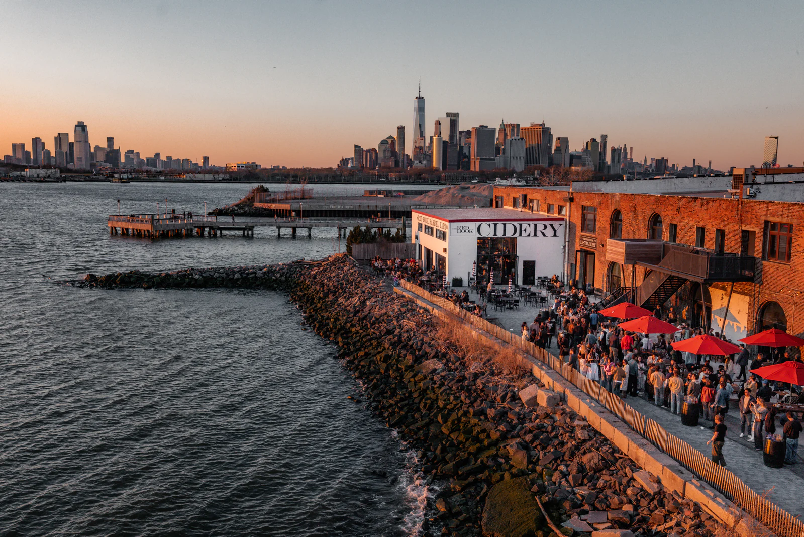 Brooklyn waterfront venue at dusk with the Manhattan skyline